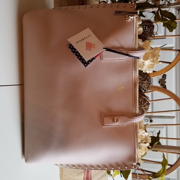 kate spade Handbags - Kate Spade studded leather tote.  On purpose